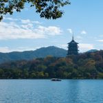 Capture of Leifeng Pagoda amidst autumn foliage at West Lake, Hangzhou, China.